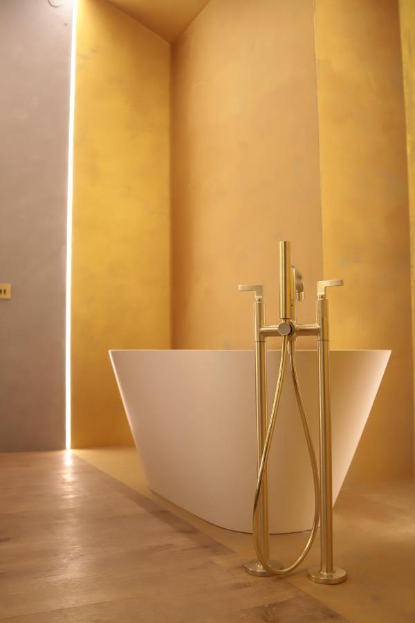 The Veil Hotel Astana Extérieur photo A modern freestanding bathtub