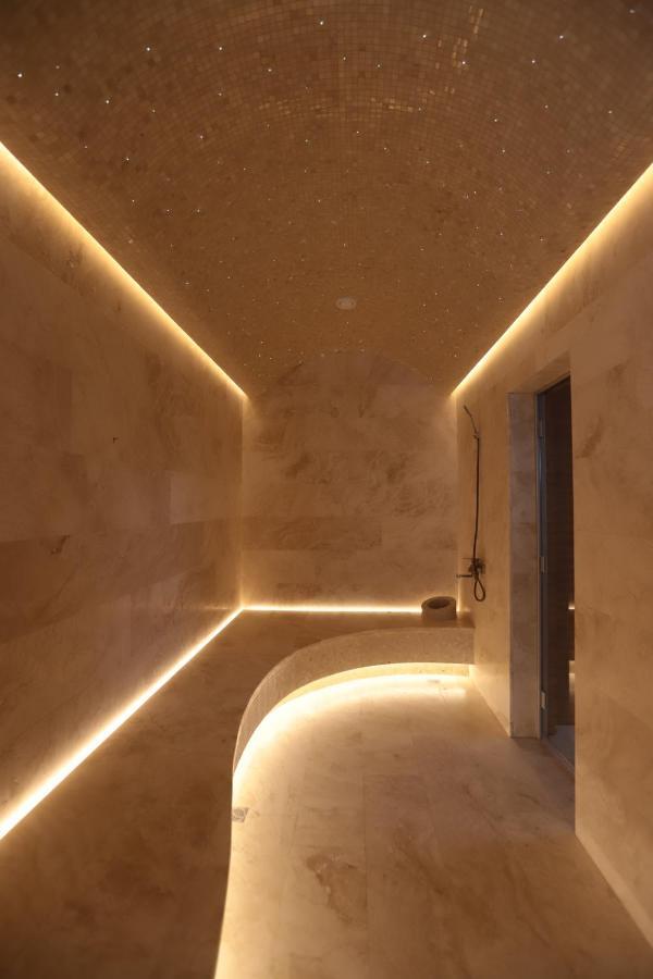 The Veil Hotel Astana Extérieur photo A steam room