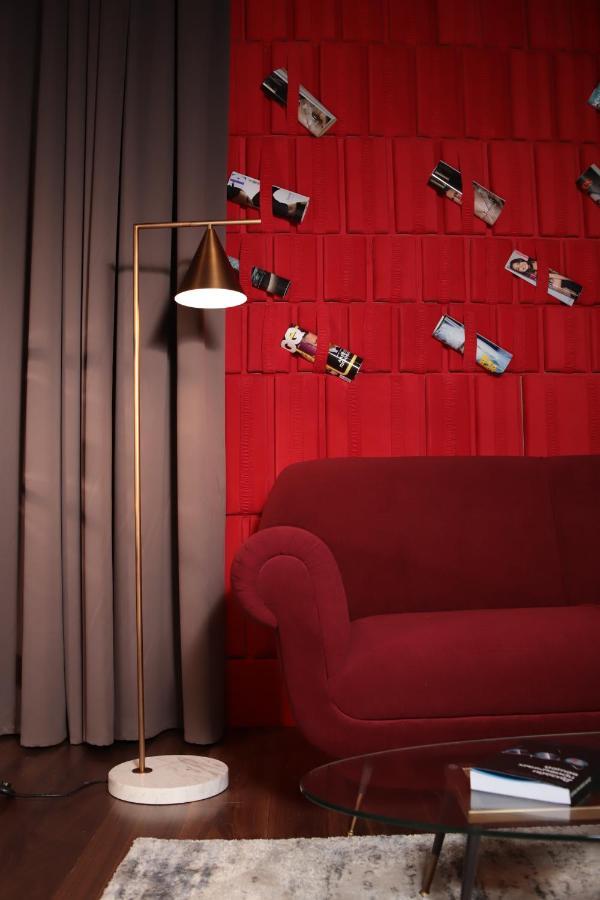 The Veil Hotel Astana Extérieur photo A 3D rendering of a room with a red wall