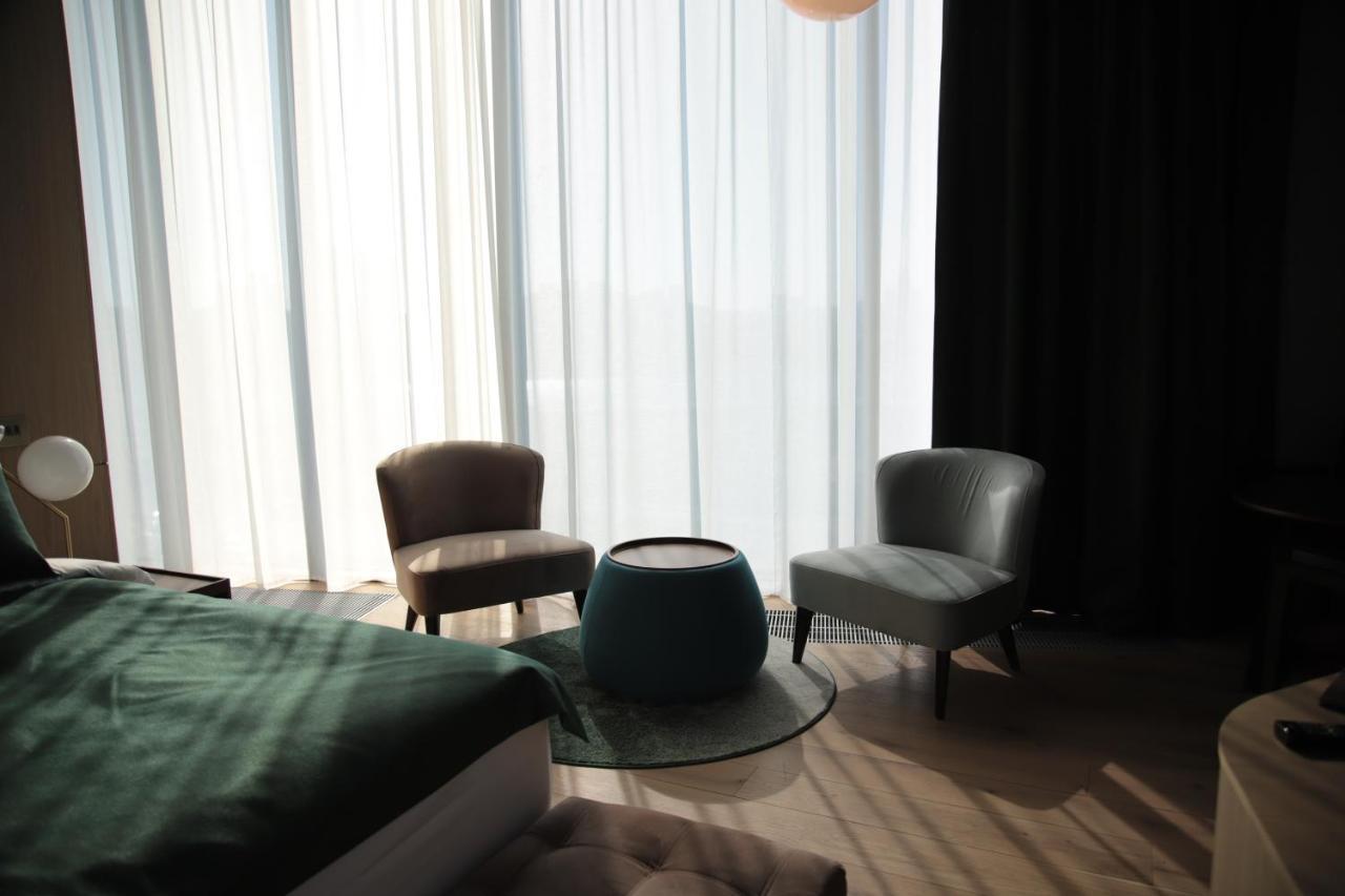 The Veil Hotel Astana Extérieur photo A room at the hotel