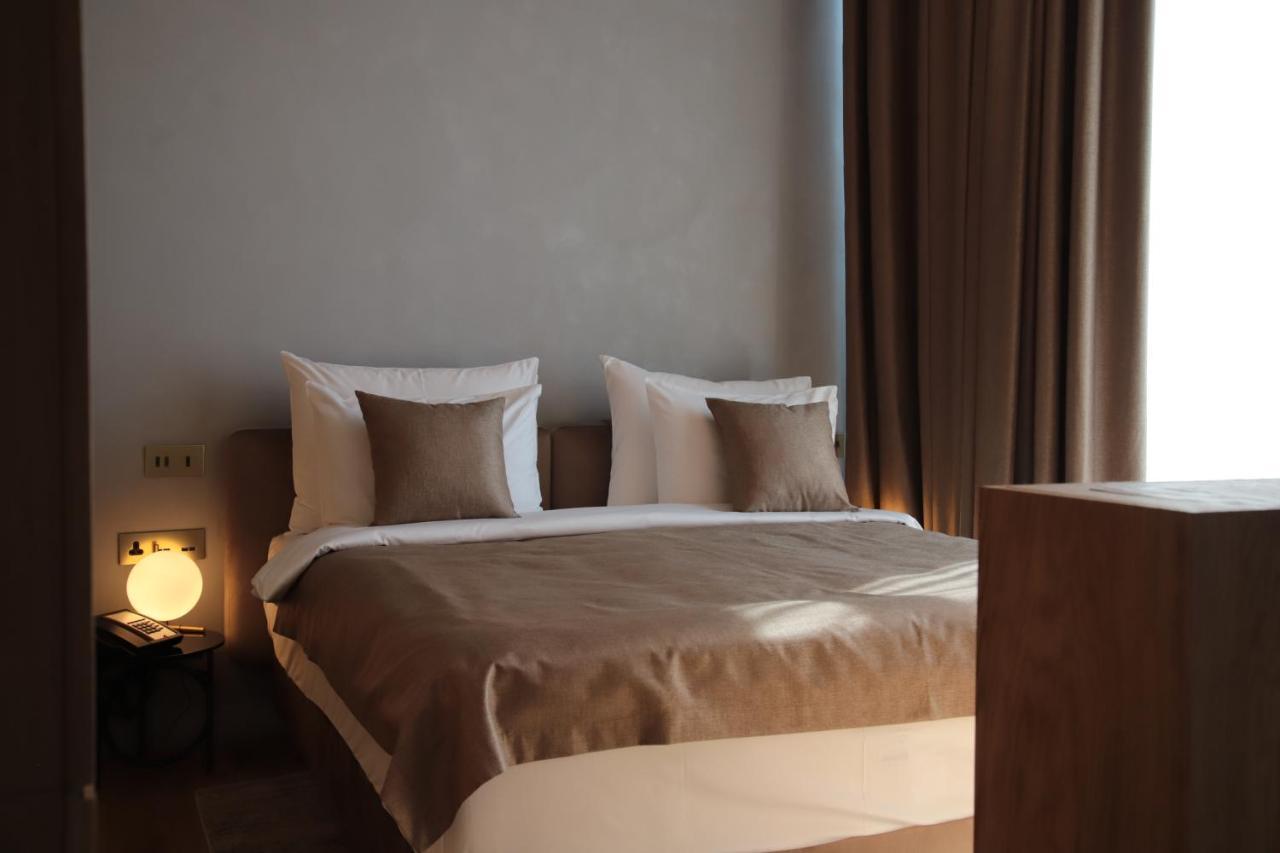 The Veil Hotel Astana Extérieur photo A bedroom at the hotel