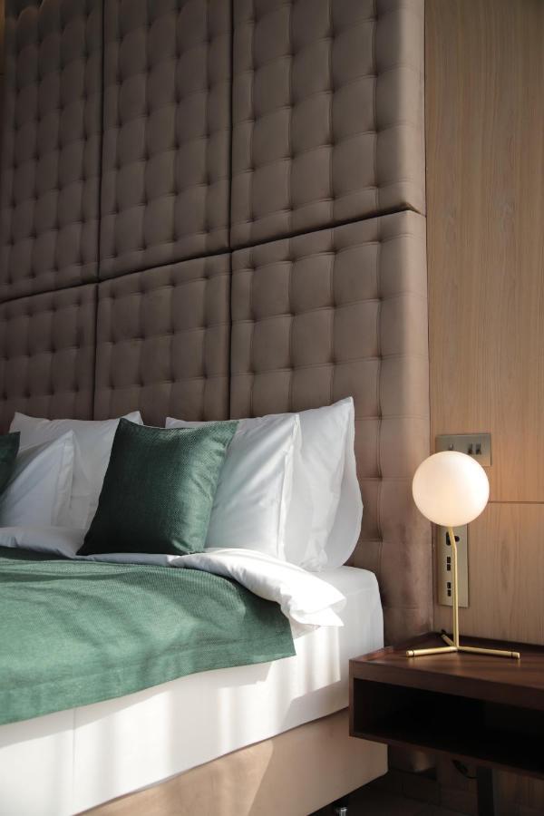 The Veil Hotel Astana Extérieur photo A wall-mounted light